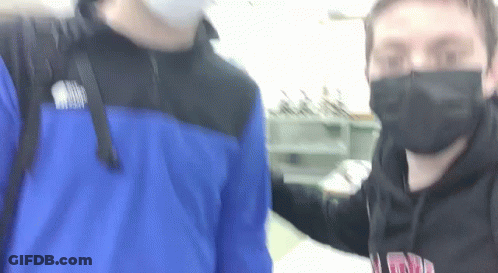 Two Men Wearing Face Masks GIF