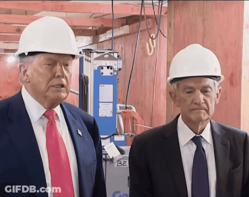 Two Men Wearing Hard Hats Are Standing Next To A Machine That Says Be On It GIF