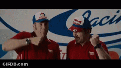 Two Men Wearing Hats And Shirts Standing Together GIF