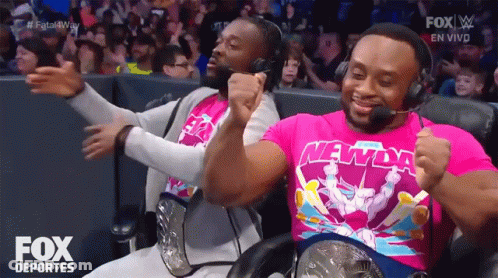 Two Men Wearing Headphones And 'New Day' Shirt GIF