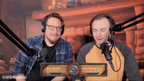 Two Men Wearing Headphones At Microphone GIF