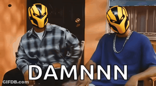 Two Men Wearing Masks Are Sitting Next To Each Other And The Word Damnnn Is On The Bottom GIF