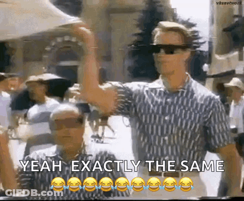 Two Men Wearing Sunglasses Are Standing Next To Each Other And Laughing . GIF