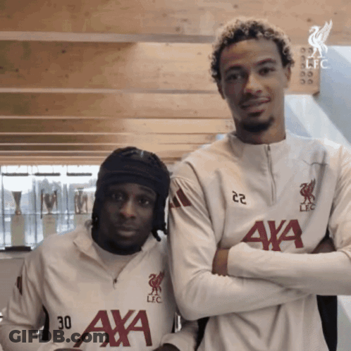 Two Men With Arms Crossed One Wearing Jersey 30 GIF