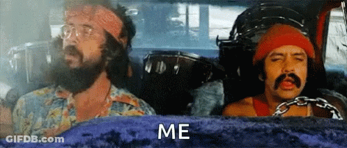Two Men With Beards And Mustaches Are Sitting In A Car And One Of Them Is Holding A Drum . GIF