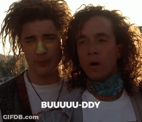 Two Men With Curly Hair Are Standing Next To Each Other And One Of Them Is Saying Buuuuuu-Ddy GIF
