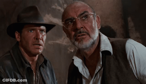 Two Men With Glasses And Beard Looking GIF