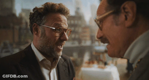 Two Men With Glasses And Mustaches Talking GIF