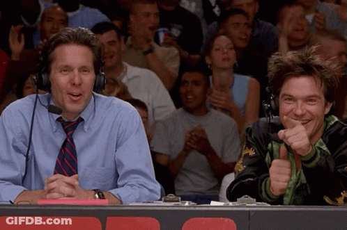 Two Men With Headphones In Front Of Crowd GIF