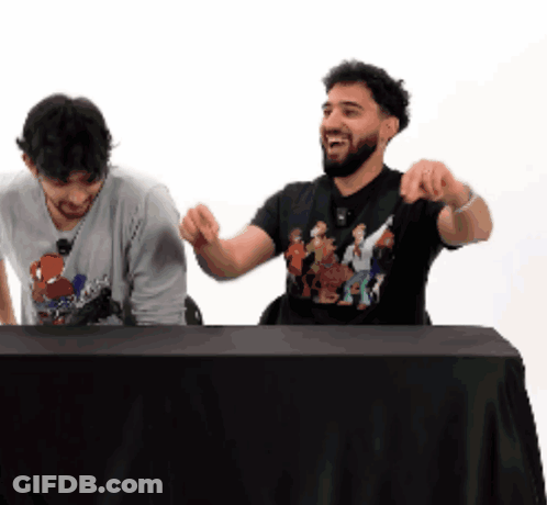 Two Men With Raised Hands Cartoon Shirt GIF