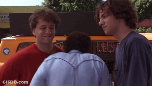 Two Men With Yamaha Sticker On Back GIF