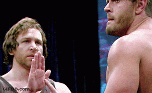 Two Men Without Shirts Are Standing Next To Each Other With Their Hands Together GIF