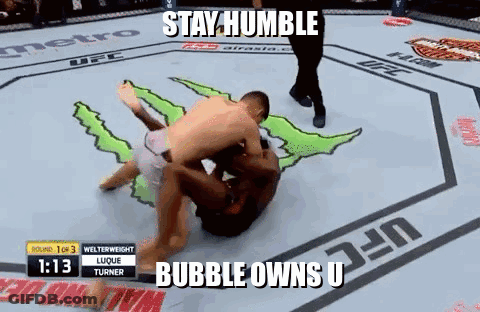 Two Men Wrestling In Boxing Ring Stay Humble Bubble Owns U GIF