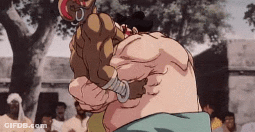 Two Men Wrestling In Front Of Crowd GIF