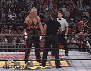 Two Men Wrestling In Ring GIF