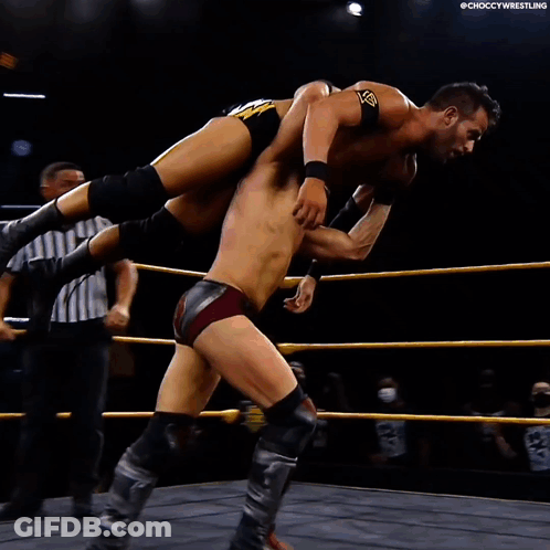 Two Men Wrestling In Ring Choccywrestling GIF