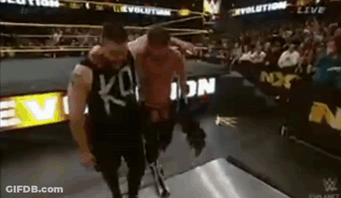 Two Men Wrestling In Ring GIF