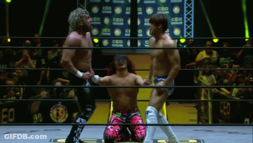 Two Men Wrestling In Ring New Castle Banner GIF