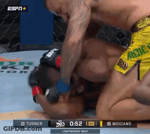 Two Men Wrestling In Ring, One In Yellow Mexico Shorts GIF