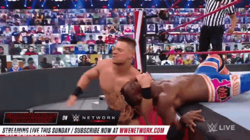 Two Men Wrestling In Ring Streaming Live Sunday Subscribe Now At WWENetwork GIF
