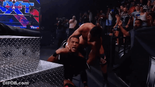 Two Men Wrestling In Ring GIF