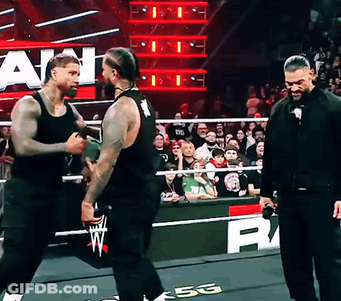 Two Men Wrestling In Ring With 5G Sign GIF