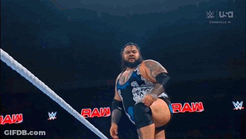 Two Men Wrestling In Ring With Crowd GIF