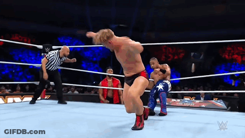 Two Men Wrestling In Ring With Referee GIF