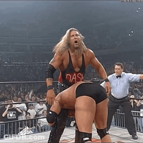 Two Men Wrestling In Ring With Referee GIF