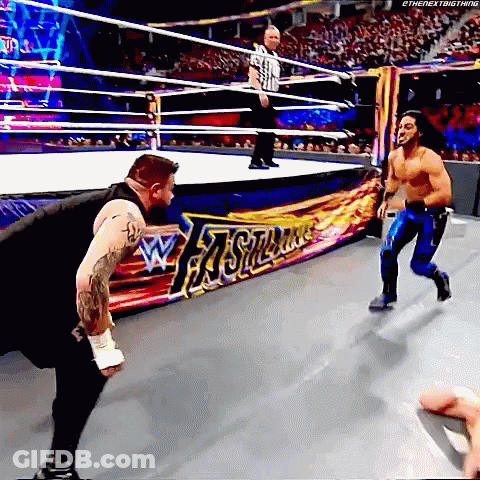 Two Men Wrestling In Ring With Referee GIF