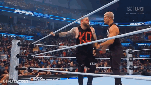 Two Men Wrestling In Ring With USA Sign GIF