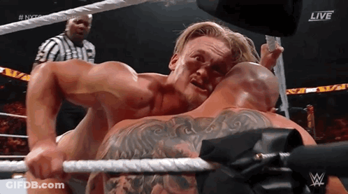 Two Men Wrestling Live GIF