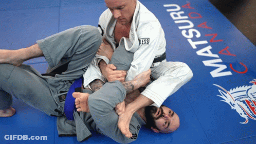 Two Men Wrestling On Matsuri Canada Mat GIF