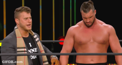Two Men Wrestling, One In I Nne Shirt GIF