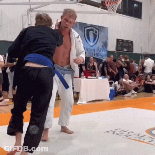 Two Men Wrestling Rappelling Tries Sign GIF