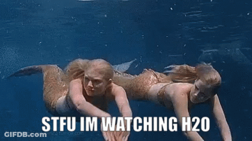 Two Mermaids Swimming Saying STFU Im Watching H20 GIF