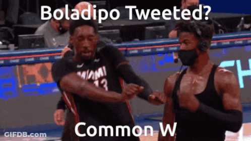 Two Miami Basketball Players Dancing In Face Masks GIF