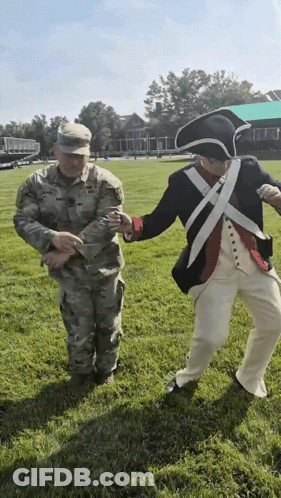Two Military Men Holding Hands GIF