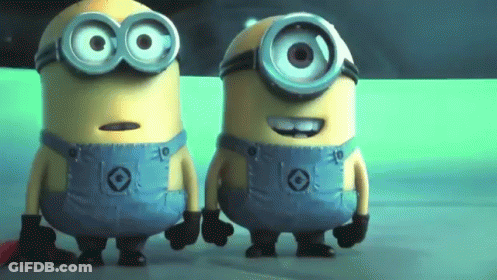 Two Minions Standing Next To Each Other GIF