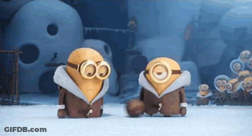 Two Minions Wearing Goggles And Coats Are Standing Next To Each Other In The Snow GIF