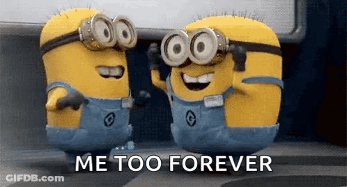 Two Minions Wearing Goggles And Overalls Are Standing Next To Each Other . GIF