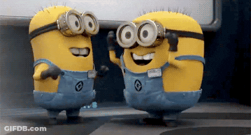 Two Minions Wearing Goggles And Overalls With Letter C GIF