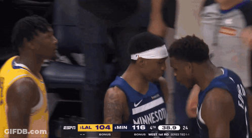 Two Minnesota Basketball Players Talking GIF