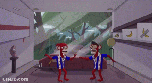Two Monkeys Dancing In Room With Bananas GIF