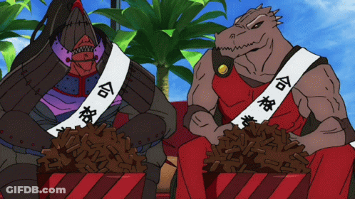 Two Monsters Are Sitting Next To Each Other With One Wearing A Sash That Says ' Com ' On It GIF