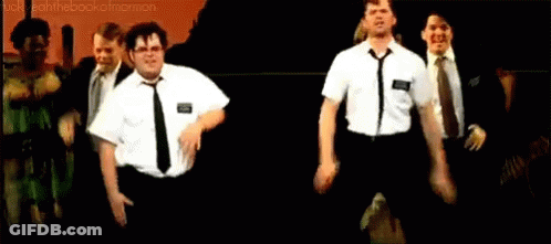 Two Mormons Standing Together GIF
