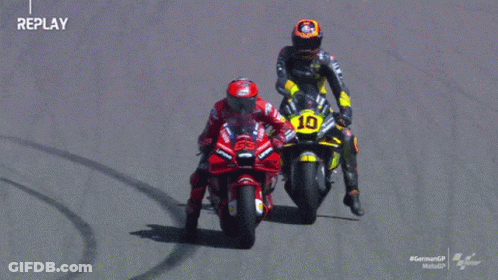 Two Motorcycle Racers Yellow Bike Number 10 GIF