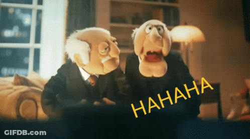 Two Muppets Are Laughing In Front Of A Screen That Says ' Hahaha ' On It GIF