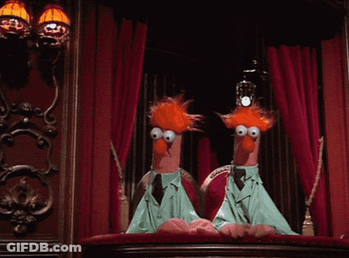 Two Muppets Are Sitting On A Balcony With A Red Curtain In The Background GIF