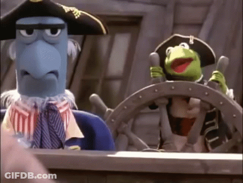 Two Muppets In Pirate Hats Steering Boat GIF